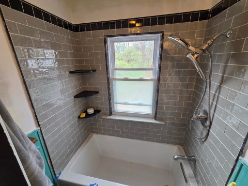 Tile Shower with Shelves, New Kholer Soaking Tub and Best Fixtures And Hardware Delta Has to offer